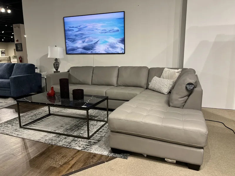 Palliser leather sectional on The Sofa Store showroom floor in Towson